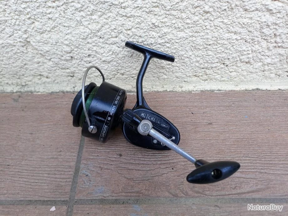 MOULINET MITCHELL 306 A . PARFAIT ETAT DE FONCTIONNEMENT . COMPLET . PETIT PRIX . 1 MOULINET MITCHELL 306 A . PARFAIT ETAT DE FONCTIONNEMENT . COMPLET . PETIT PRIX .